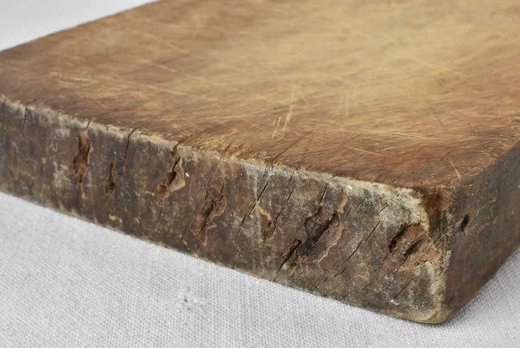 Antique French cutting board with rounded shoulders 17" x 9"