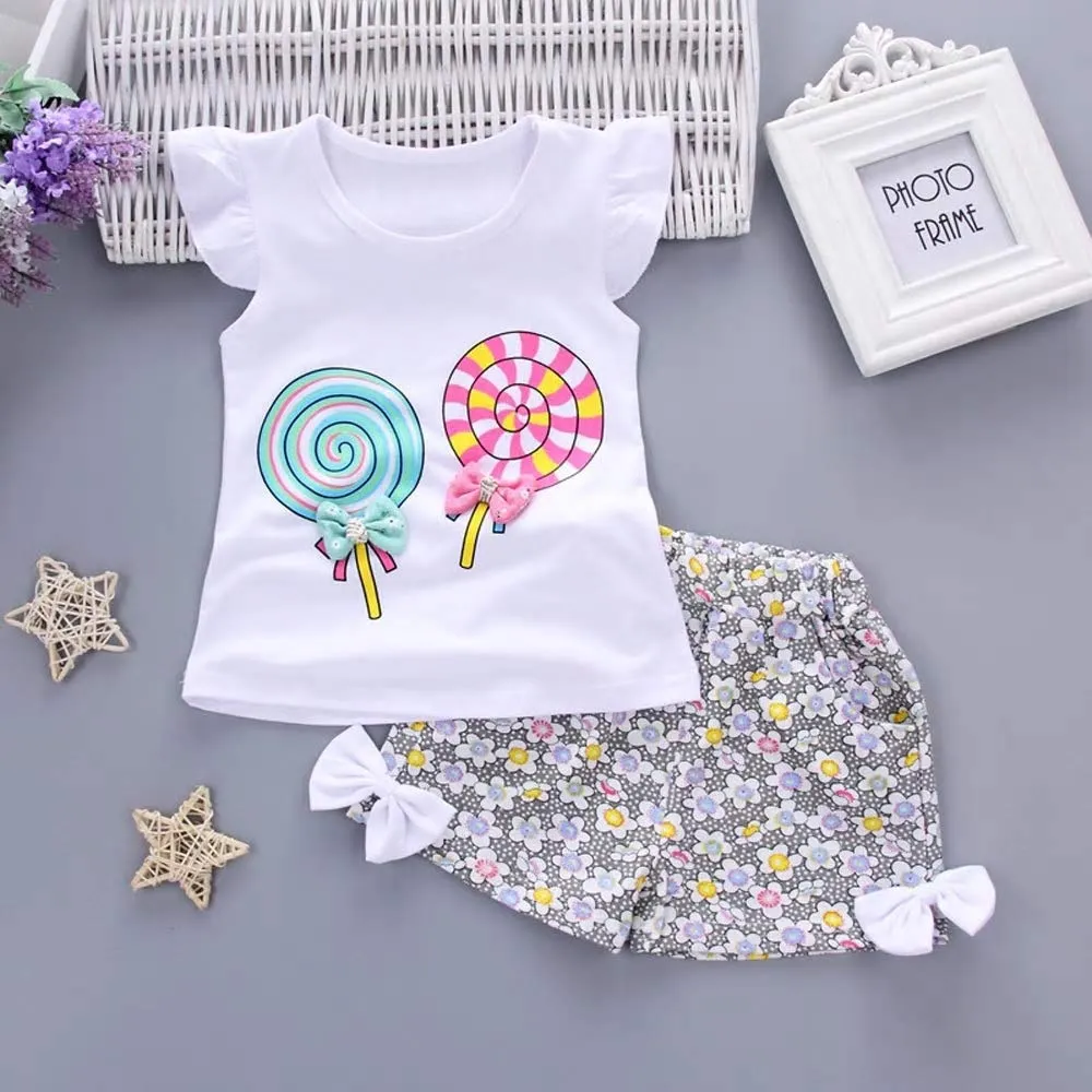 Bold N Elegant - Be Bold Inside & Elegant Outside Baby Girl's Clothes Cute Candy Bow Ruffle Top and Shorts Set (White, 6-12 Months)