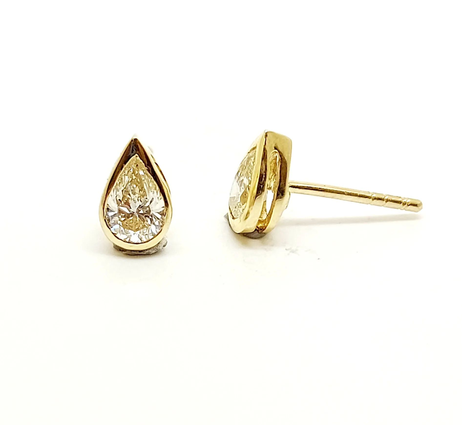 Diamond Pear-Cut Stud Earrings In 14k Yellow Gold