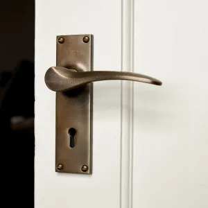 Distressed Antique Brass Penwerris Lever Lock Door Handles