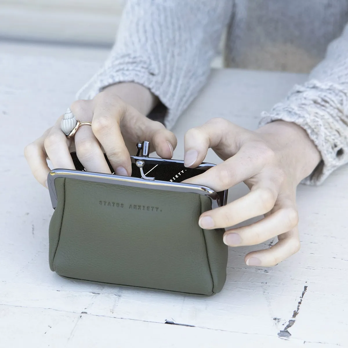 STATUS ANXIETY - Volatile Purse