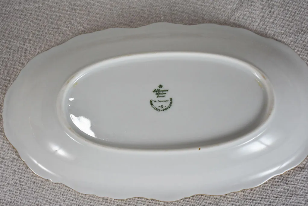 Superb 1960's porcelain dinnerware with gold rim