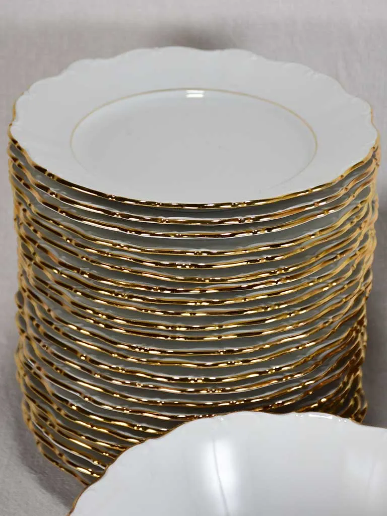 Superb 1960's porcelain dinnerware with gold rim