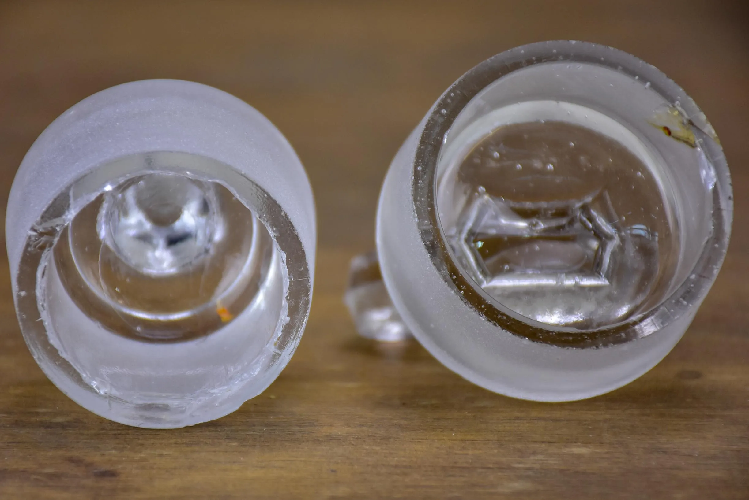 Two antique French glass apothecary bottles