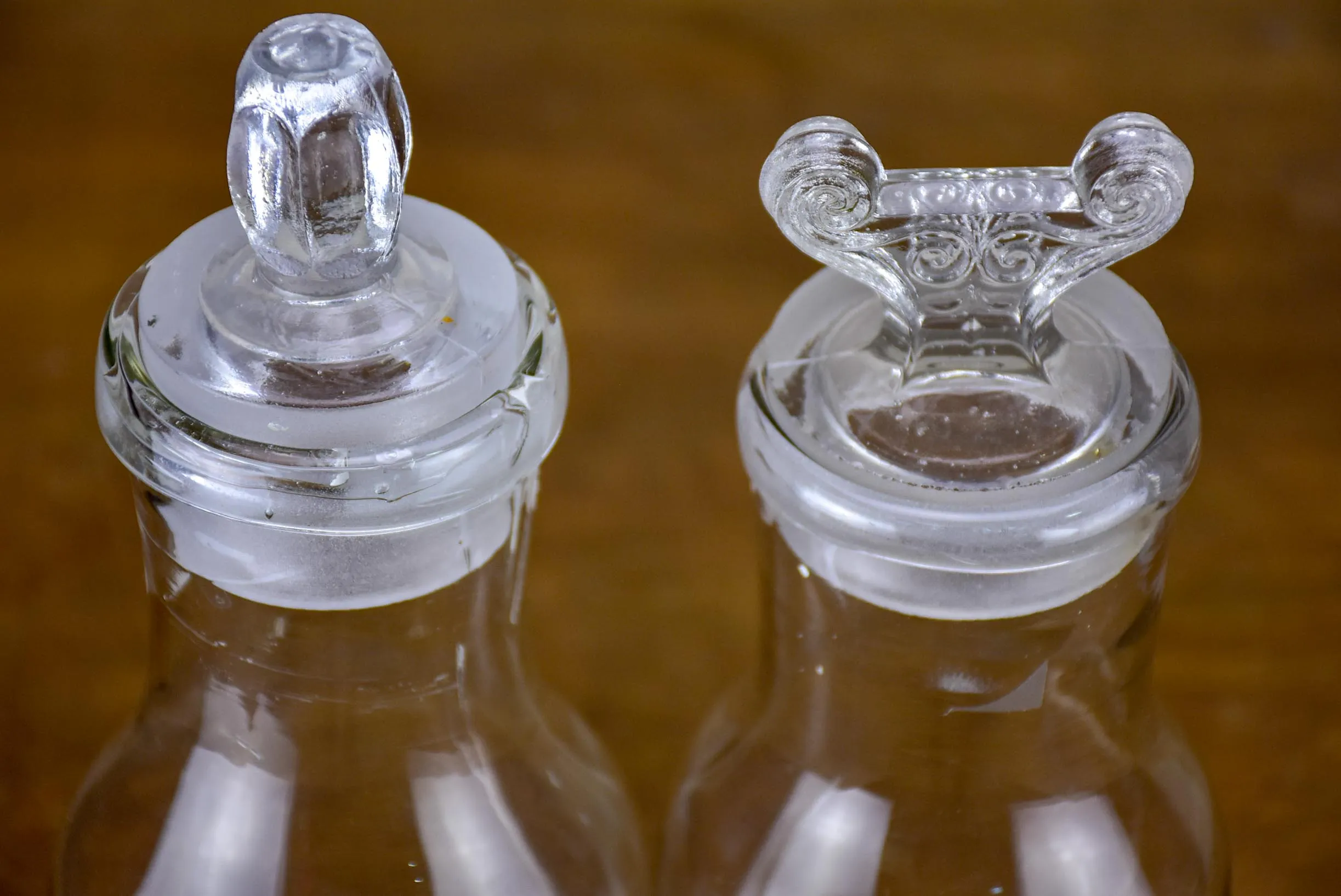 Two antique French glass apothecary bottles