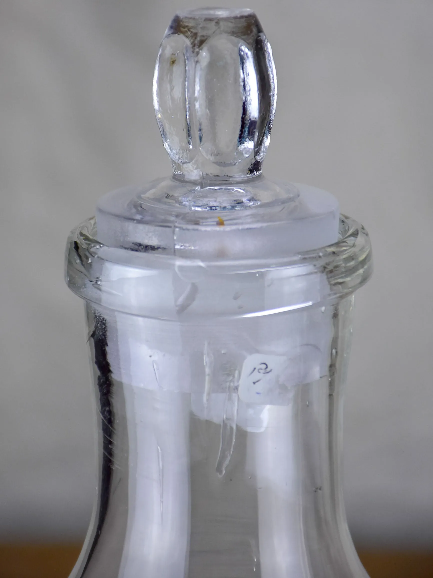 Two antique French glass apothecary bottles