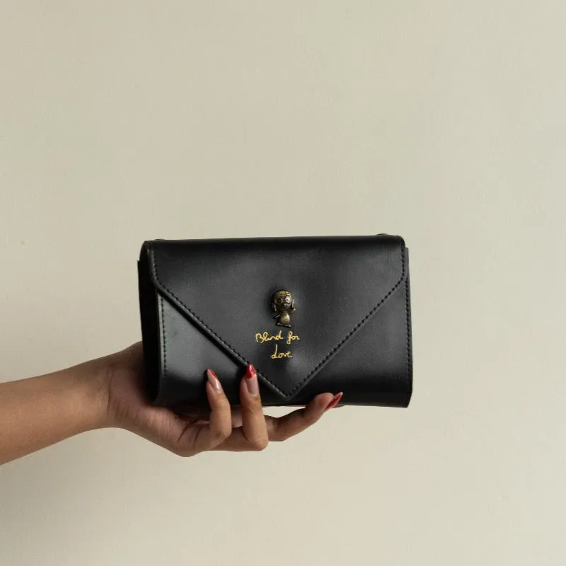 Vintage Leather Sling Clutch